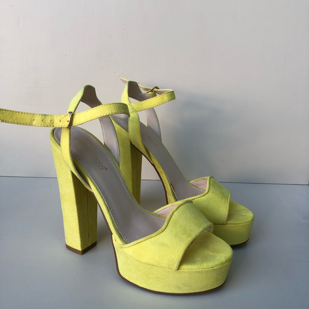 Yellow high heeled shoes